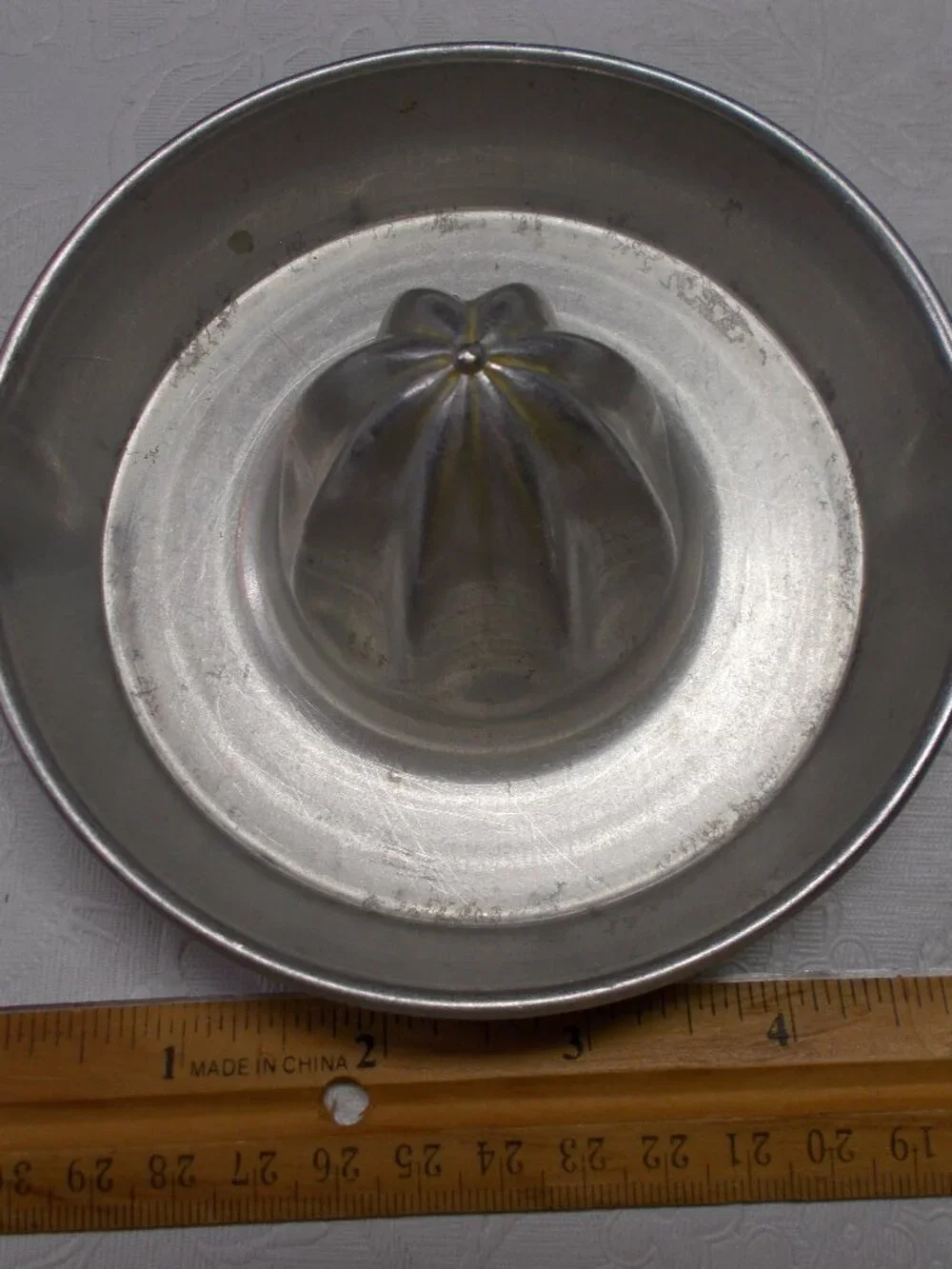 Vintage aluminum citrus juicer, 5